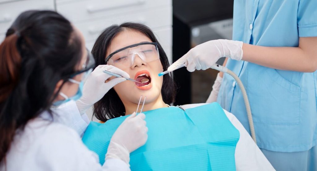 Achieving Dental Health with Proper Oral Hygiene and Regular Visits to the Dentist